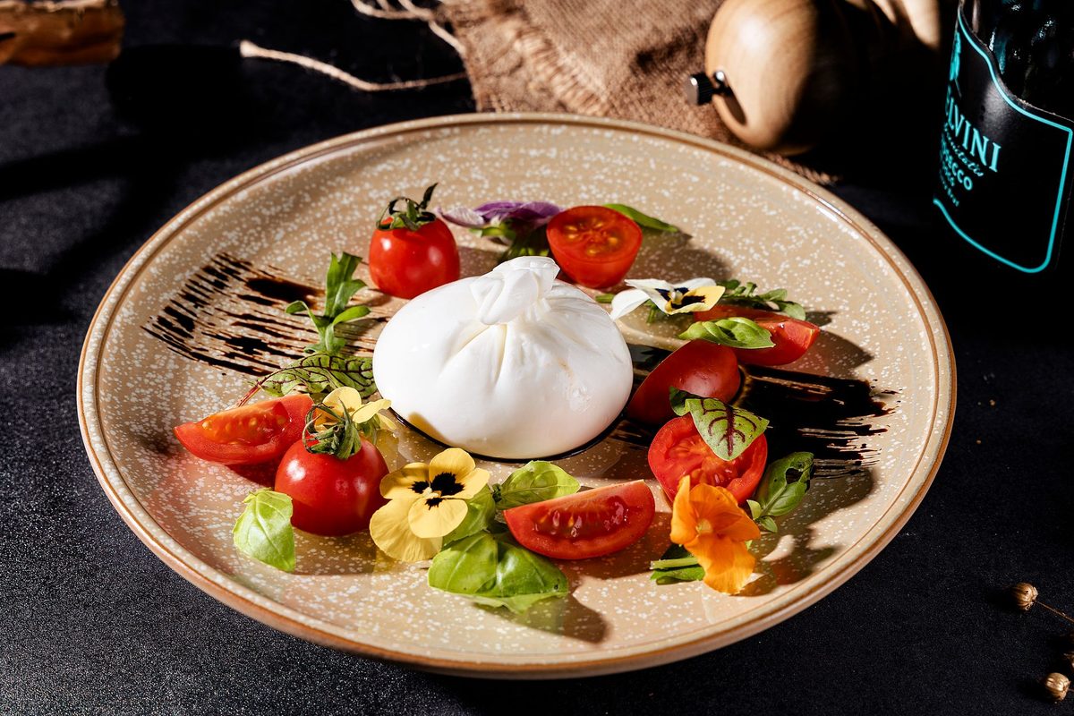 Burrata, tomates cerises confites
